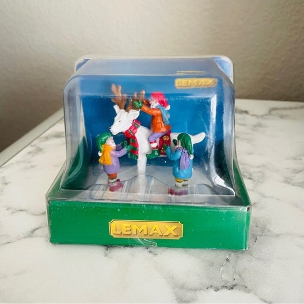Lemax Village Collection figurine called "Storybook Santa".
